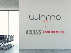 Office view of Winmo and Access Confidential's logo on the wall